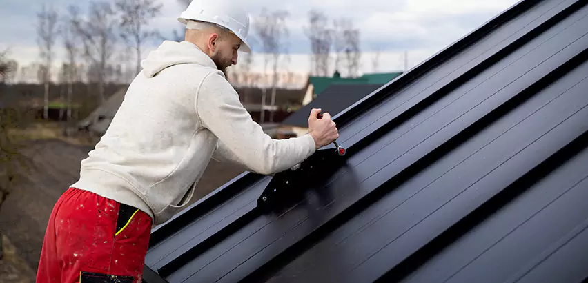 Tin Roof Ridge Cap Installation in Oak Park